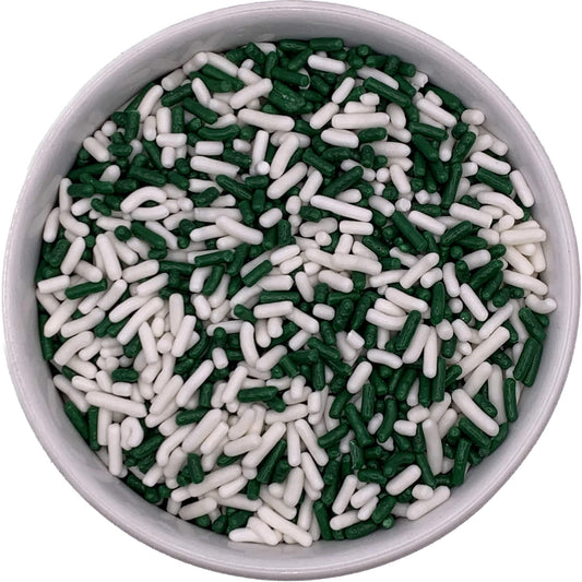Green and white jimmies sprinkle blend in a bowl, ideal for St. Patrick's Day cake and cupcake decorating.