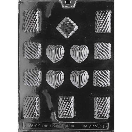 Grooved Assortment Pieces chocolate mold with 12 cavities featuring hearts, diamonds, squares, and rectangles with unique grooved designs, made from food-grade plastic.