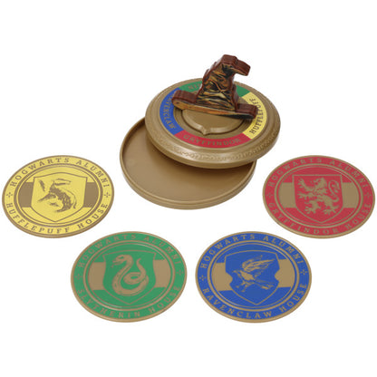 A spinning Sorting Hat with four Hogwarts House coasters, featuring Gryffindor, Slytherin, Hufflepuff, and Ravenclaw designs.