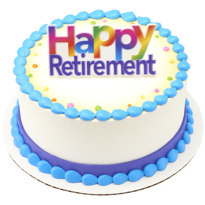 Round white cake with blue trim and colorful confetti dots, topped with a rainbow "Happy Retirement" cake pick
