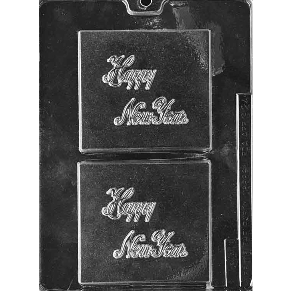 Clear plastic chocolate mold with two large square cavities, each with raised cursive “Happy New Year” lettering inside a square border, shown on a dark background.