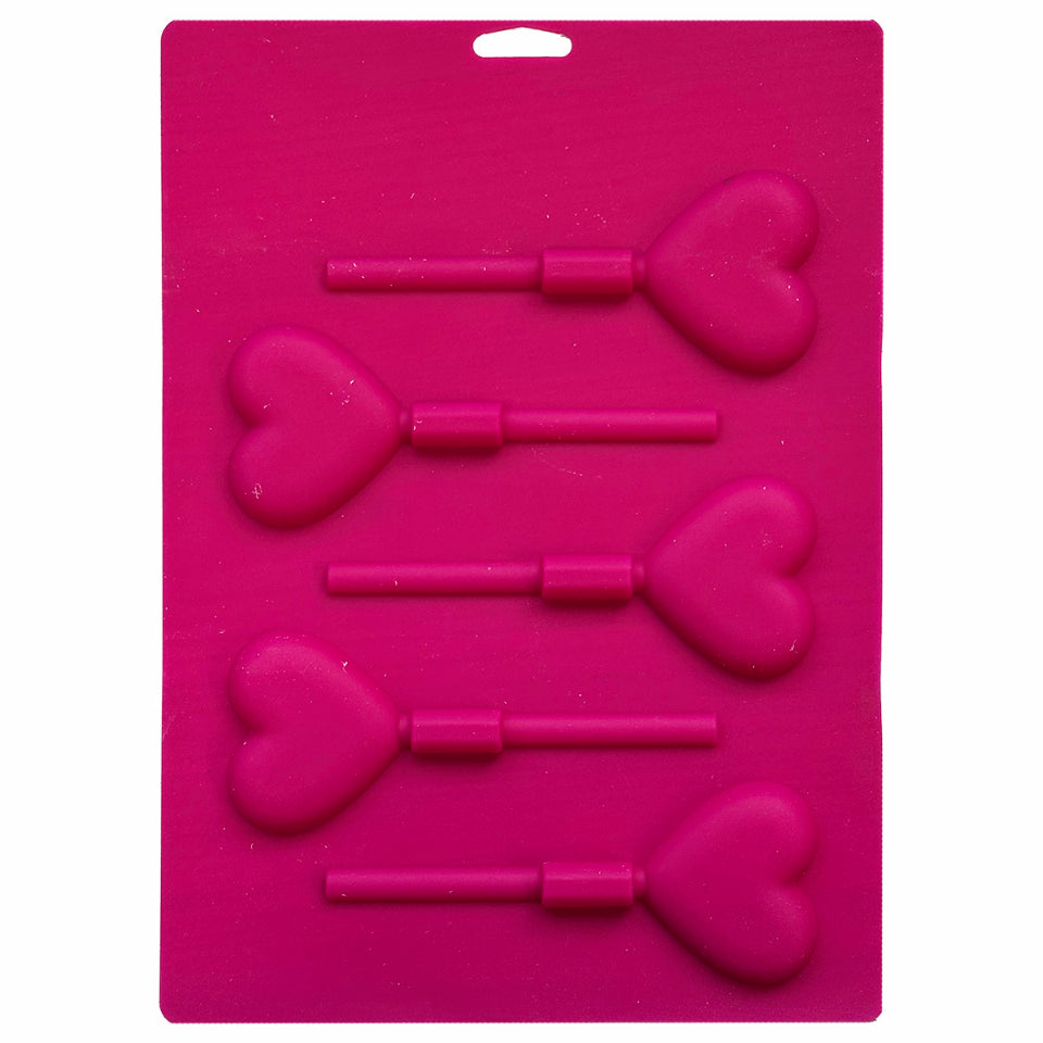 Pink silicone mold with five heart-shaped lollipop cavities, including stick channels, designed for candy and chocolate making.