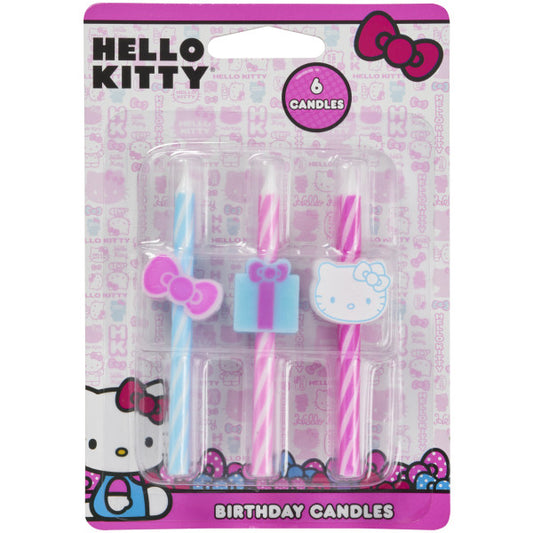 Package of 6 Hello Kitty birthday candles with pink and blue swirls and themed toppers including a bow, gift, and Hello Kitty face.