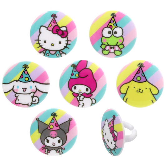 Assorted Hello Kitty and Friends cupcake rings with round toppers, pastel rainbow stripe backgrounds, and characters wearing party hats, shown on a white background with one ring turned sideways.