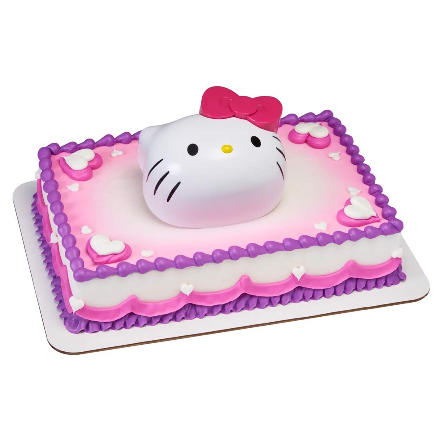 A square cake topped with a large Hello Kitty figure and surrounded by delicate icing hearts and bows, including a surprise toy set, creating a delightful centerpiece for Hello kitty fans.