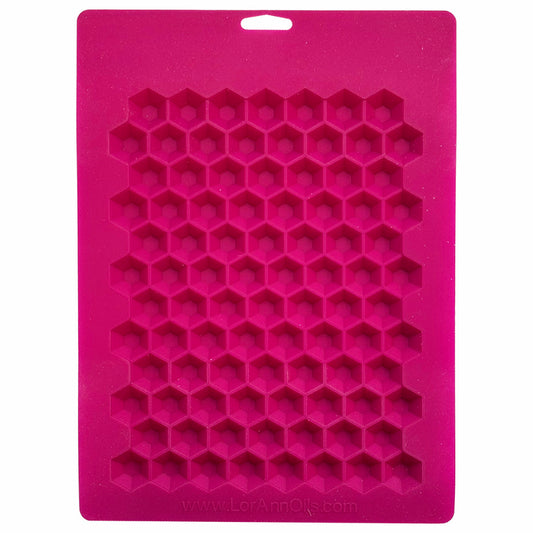 Reverse view of the same pink silicone mold showing depth and detailing of the 90 geometric cube cavities.