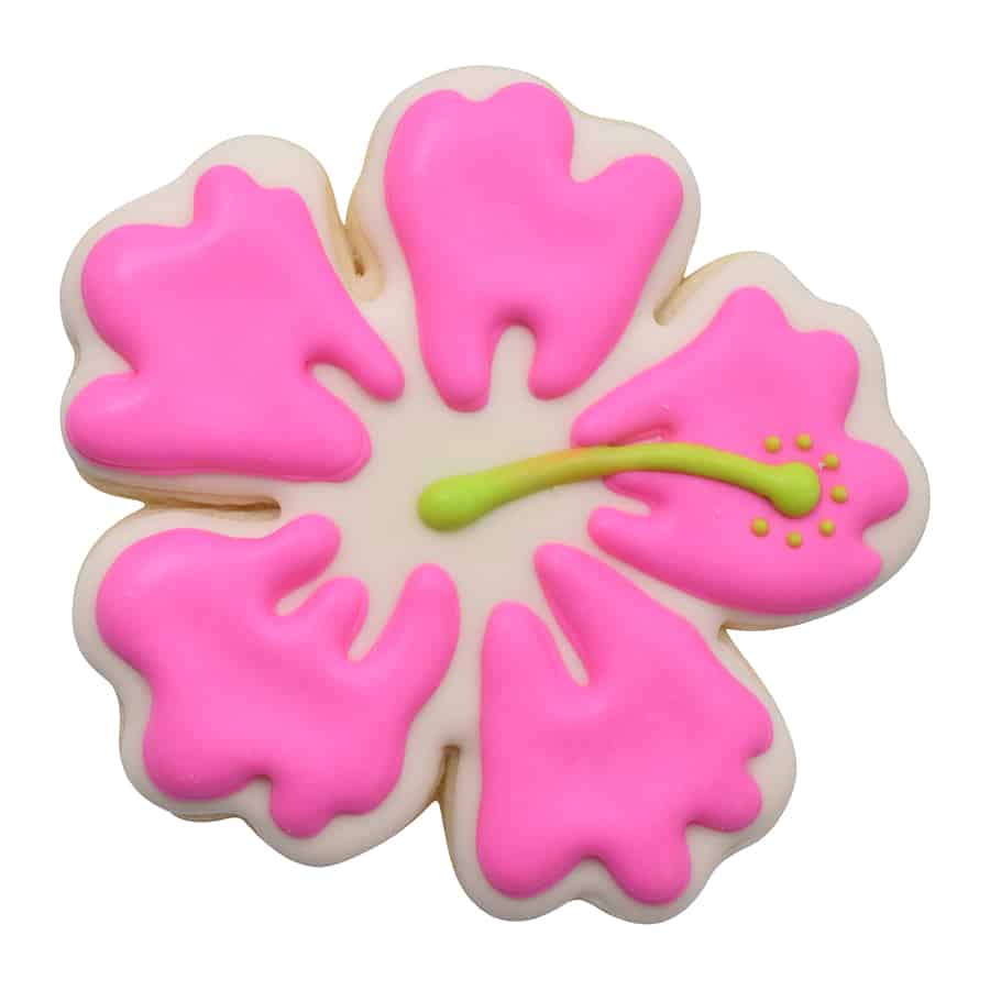 A decorated hibiscus flower cookie with pink icing and a green stamen, designed with a tropical theme.