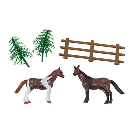 A horse-themed cake topper set with two realistic horse figurines, one brown and one white with brown spots, alongside two green pine trees and a brown fence, ideal for equestrian events and animal lovers' celebrations.