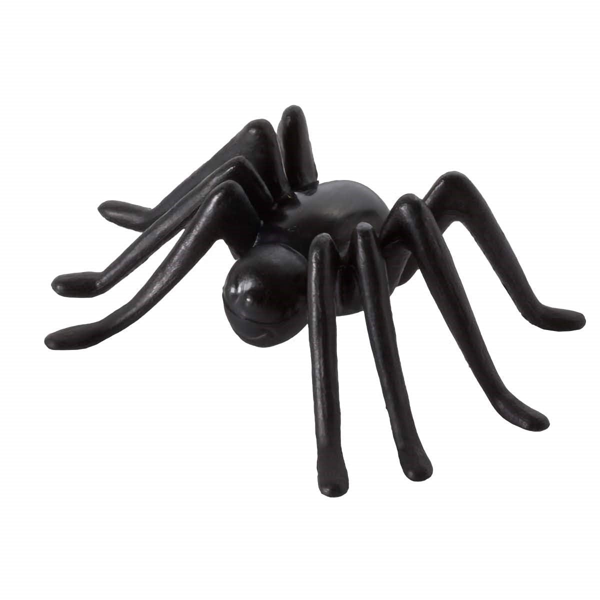 An eerily realistic spider cake topper, crafted with meticulous attention to detail, from its glossy black body to its eight slender legs poised to skitter. This lifelike arachnid is perfect for Halloween celebrations, spooky-themed birthday parties, or to top treats at an insect-themed educational event.