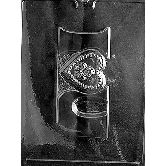 Clear plastic chocolate mold with one long rectangular cavity featuring raised “I” and “You” lettering separated by a raised heart symbol, shown on a dark background.