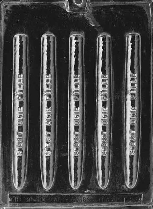 Image shows FRENCH GIRL CIGARS mold with long chocolate cavity and “C’est une fille” text in raised letters.
