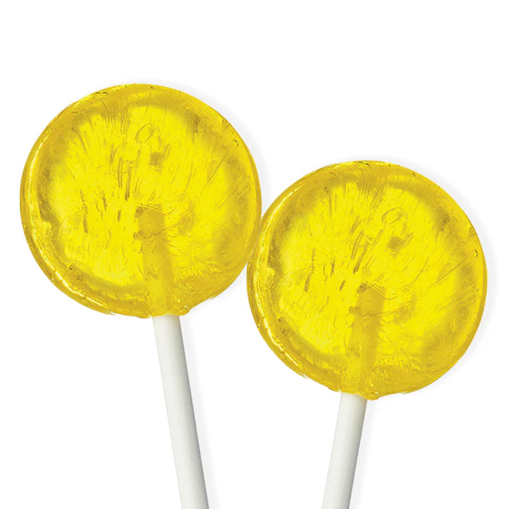 Two translucent yellow isomalt lollipops with a glossy, glass-like finish on white sticks, shown on a white background.