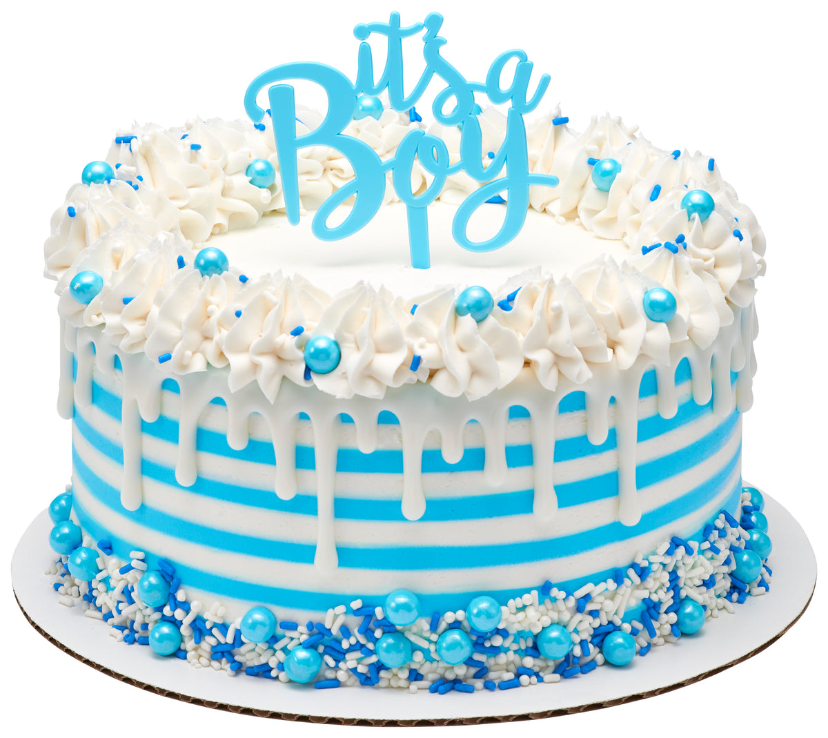 Blue and white striped celebration cake topped with a light blue “It's a Boy” cake topper, white frosting swirls, blue pearls, and matching sprinkles.