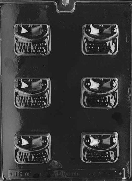 Image shows TYPEWRITER mold with detailed, retro typewriter shape in a compact layout.