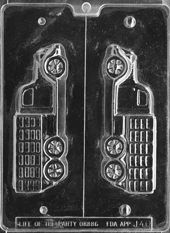 Image shows FARM TRUCK 3D mold with long rectangular chocolate truck body, wheels, and cab.