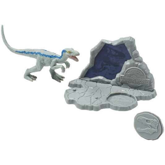 A Blue Raptor figurine alongside a rocky Jurassic World™ backdrop with a hidden fossil stamper.