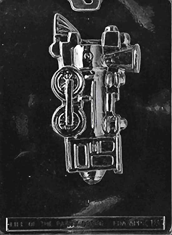 Image of TRAIN ENGINE mold with detailed chocolate locomotive featuring wheels and smoke stack.