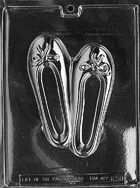 Image of K058 mold featuring a large ballet slipper design with graceful curves and detailed toe/ribbon accents.