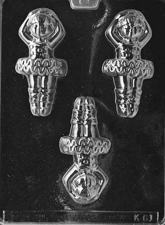 Ballerina mold K061, standing dancer figure in tutu with arms raised; slim vertical chocolate plaque.
