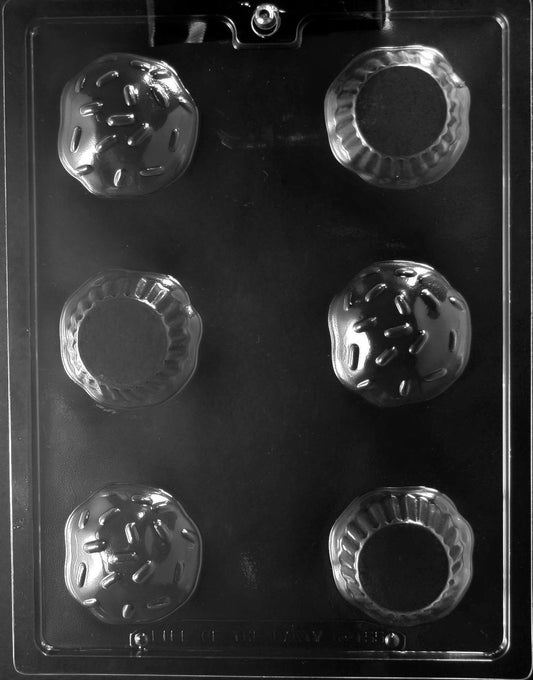 3D Cupcakes chocolate mold, clear mold forming cupcake shapes with frosting-style tops.