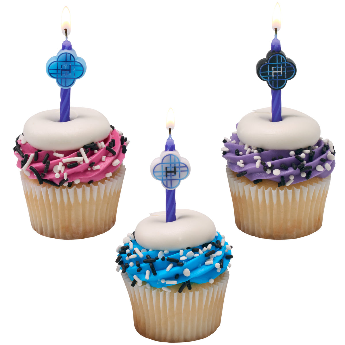 Three lit KPop Demon Hunters HUNTR/X birthday candles displayed on vanilla cupcakes with pink, blue, and purple frosting, white icing rings, and black-and-white sprinkles.