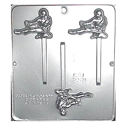 A clear, detailed plastic chocolate mold featuring two karate figures in a kicking pose, each affixed to a lollipop stick, designed for creating martial arts-themed confections suitable for karate class events or themed birthday parties.