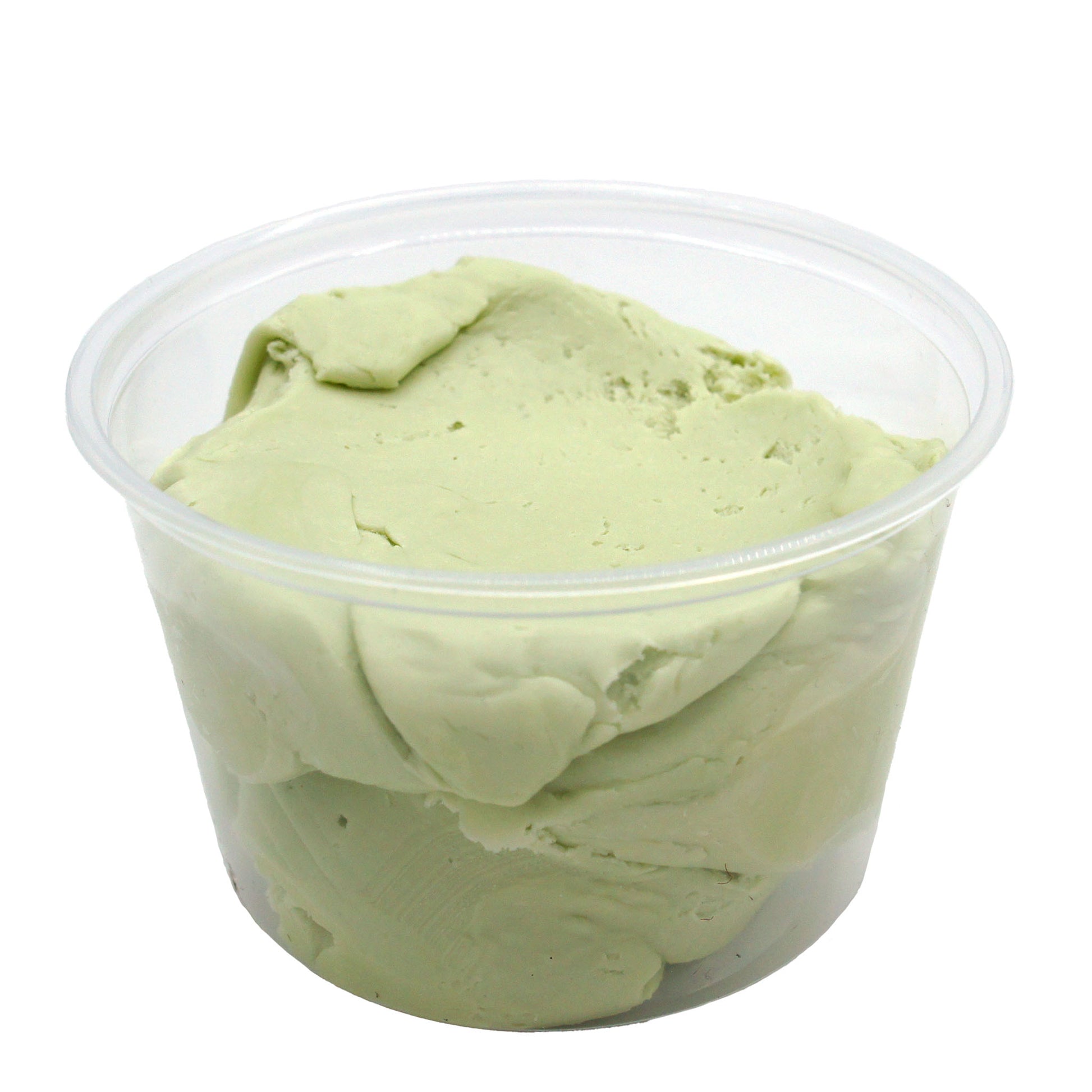 Clear plastic container filled with pale green key lime candy center, ready for shaping and dipping.