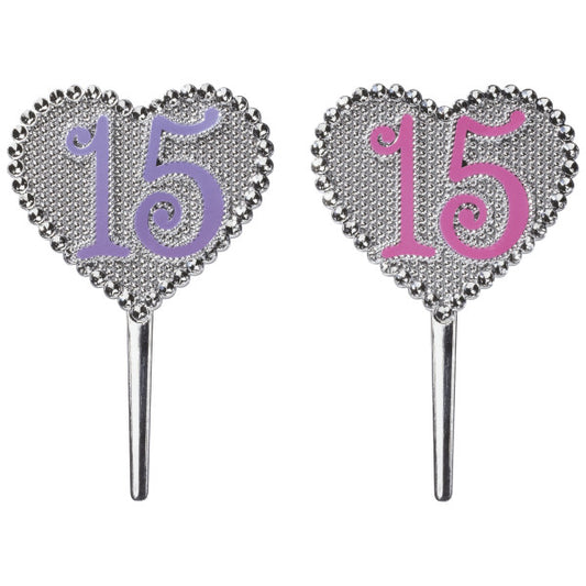 Set of two silver heart-shaped cake toppers with "15" in pink and purple for Quinceañera celebrations.