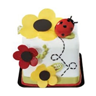 This quaint cake decoration showcases an adorable ladybug resting on a leaf, with bright red and black colors. It adds a charming and playful touch to any cake, ideal for a nature-inspired event or a young child's birthday party.