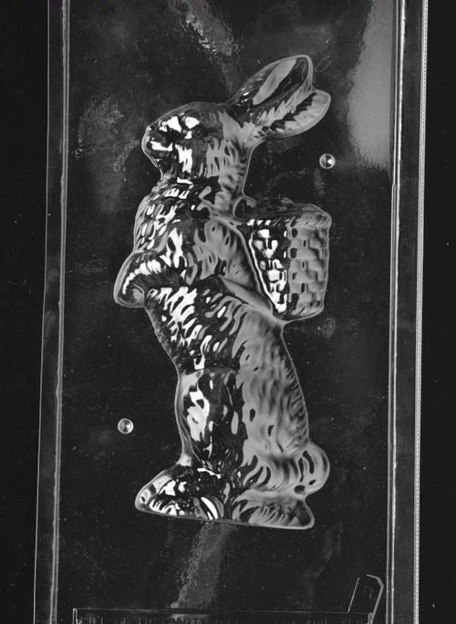 Clear plastic chocolate mold showing the matching back half of a tall bunny carrying a basket, with rounded contours and basket texture to complete the 3D chocolate mold set.