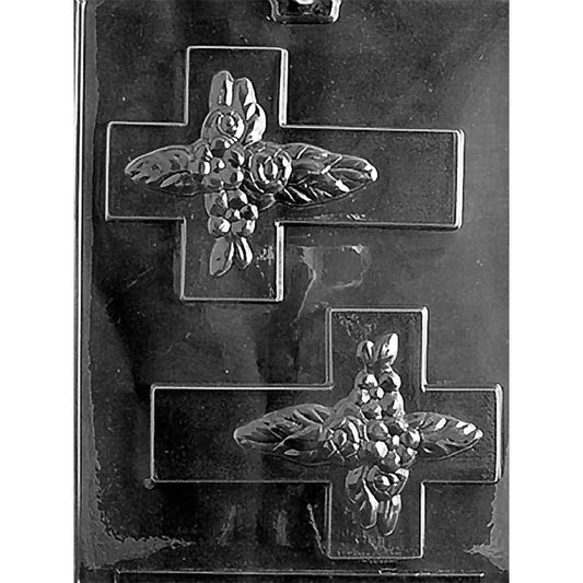 Clear plastic two-cavity large cross chocolate mold with raised roses, blossoms, and leaves through the center of each cross