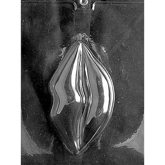 Clear plastic chocolate mold on a dark background with one large lips-shaped cavity and a pronounced center crease.