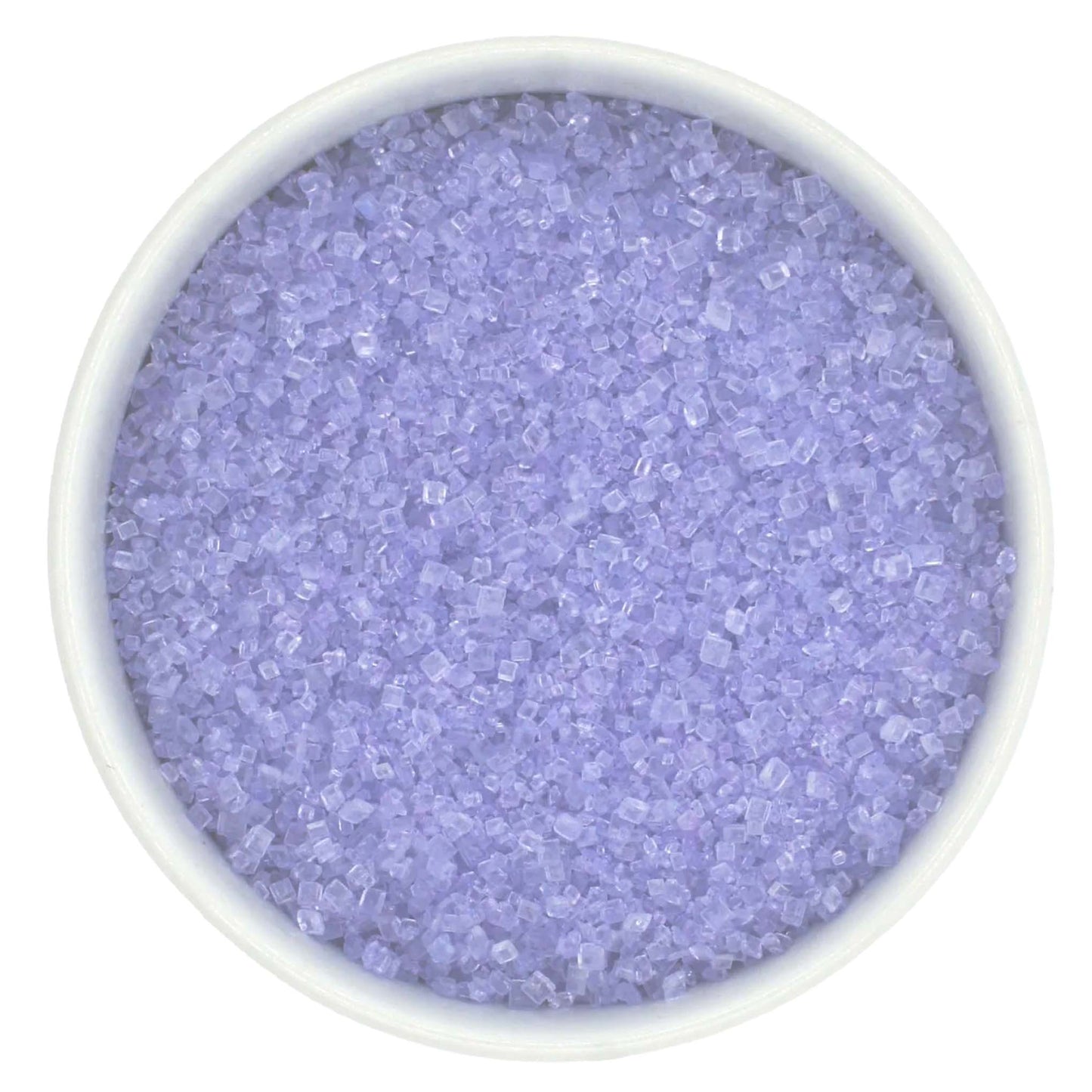 Top-down view of a white bowl filled with lavender coarse sanding sugar crystals, showing pale purple, chunky granules with a clear sparkling shine.
