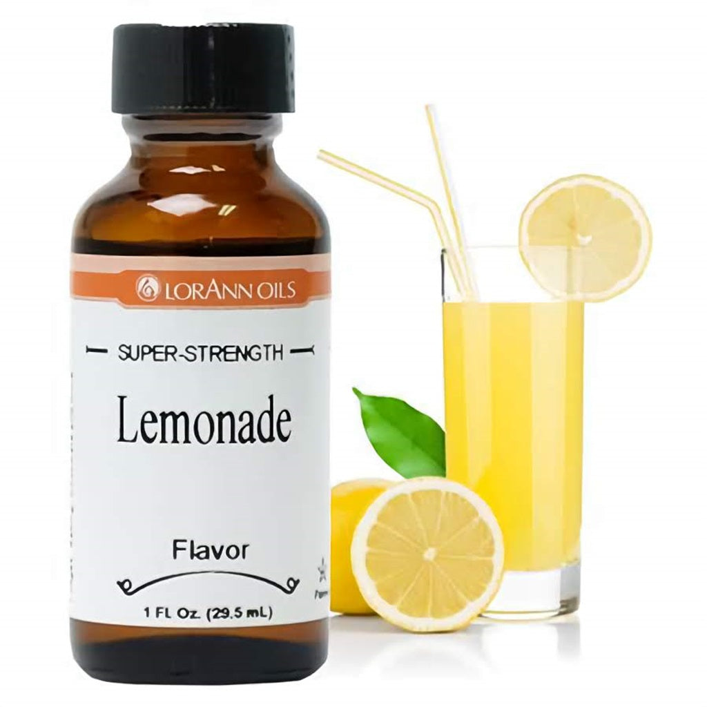 LorAnn Oils Super Strength Lemonade Flavor, 1 fl oz, beside a glass of refreshing lemonade with lemons, symbolizing a classic sweet and tangy lemonade taste.