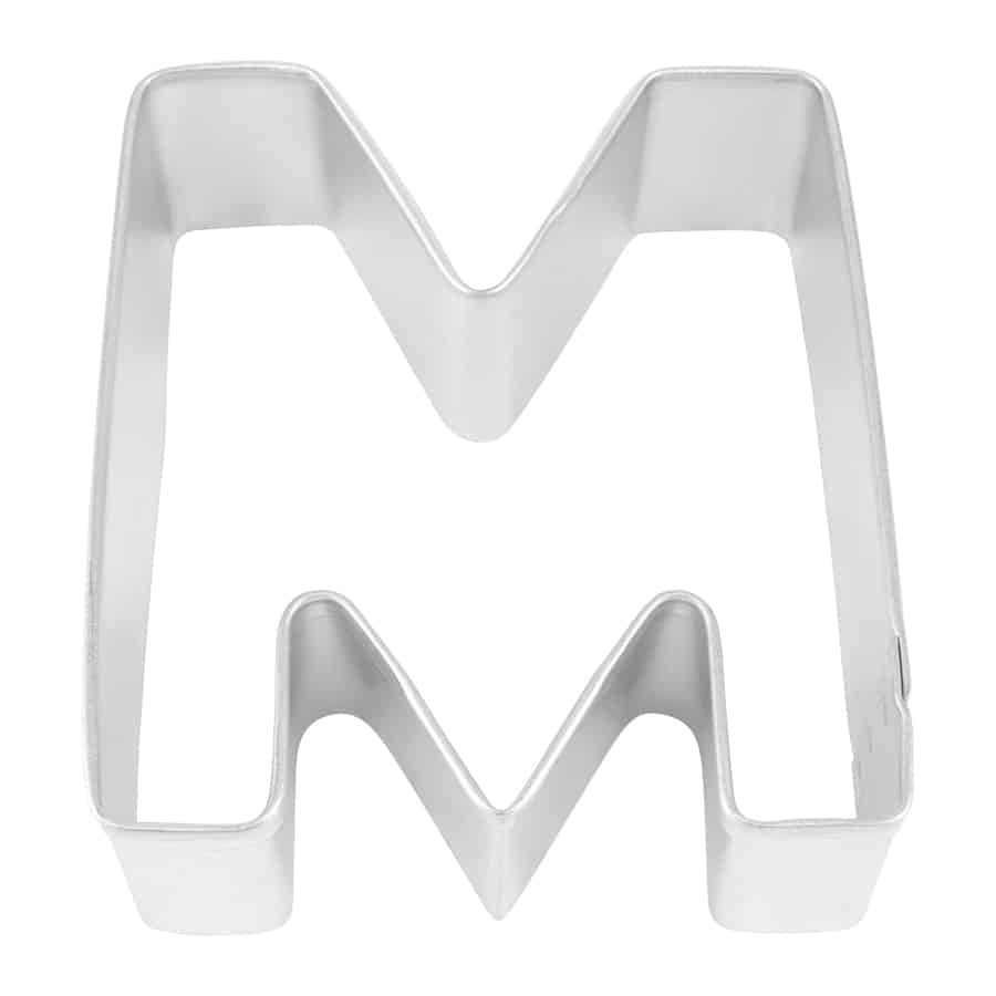 Close-up of a metal Letter 'M' cookie cutter with sturdy construction.