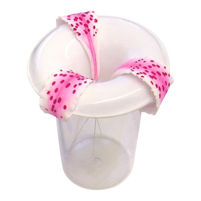 JEM Lily Former placed over a plastic container with pink sugar lily petals drying on it.