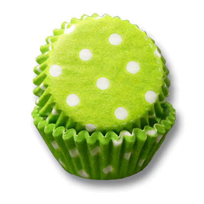 Lime green mini cupcake liner with white dots, stacked view