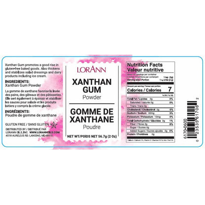 LorAnn Xanthan Gum label close-up with pink watercolor-style background, ingredient and nutrition panel, and text describing use for gluten-free baking and thickening sauces.