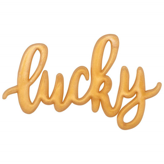 Golden 'Lucky' script cupcake topper perfect for St. Patrick's Day treats and thematic baking decorations.