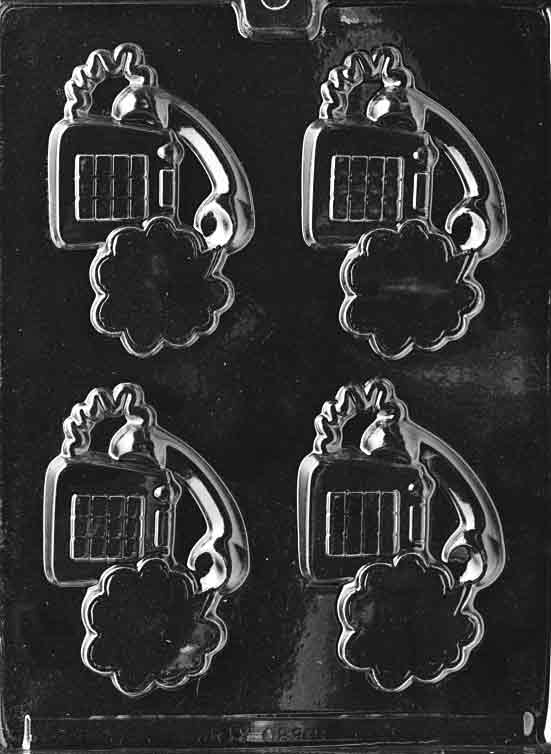 Chocolate mold M009 Talking Telephone featuring detailed retro phone design with handset and dial accents in chocolate form.