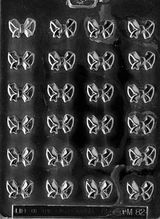 Chocolate mold M082 Bows with small bow-tie shapes designed for chocolate decorations.