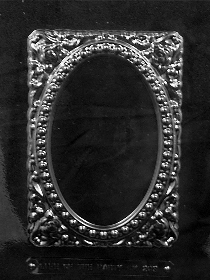 Chocolate mold M203 Floral Frame with rectangular ornate frame-shaped cavity and floral embossing.