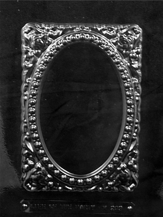 Chocolate mold M203 Floral Frame with rectangular ornate frame-shaped cavity and floral embossing.