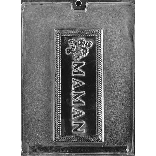 Clear plastic chocolate mold with one large rectangular cavity featuring the word “MAMAN” in raised letters and a small bouquet design at the top.