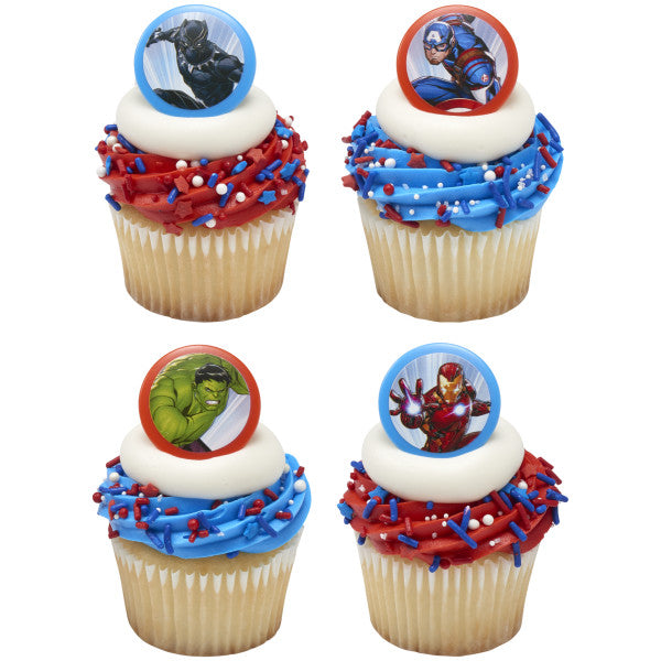Four cupcakes topped with MARVEL Avengers cupcake rings featuring Black Panther, Captain America, Hulk, and Iron Man, decorated with red, white, and blue frosting and sprinkles.