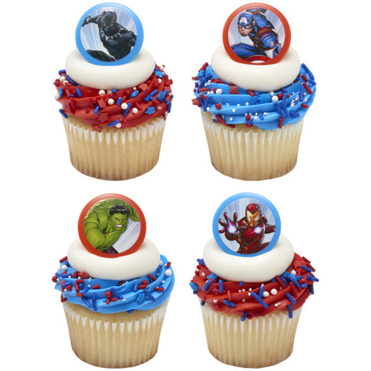 Four cupcakes topped with MARVEL Avengers cupcake rings featuring Black Panther, Captain America, Hulk, and Iron Man, decorated with red, white, and blue frosting and sprinkles.