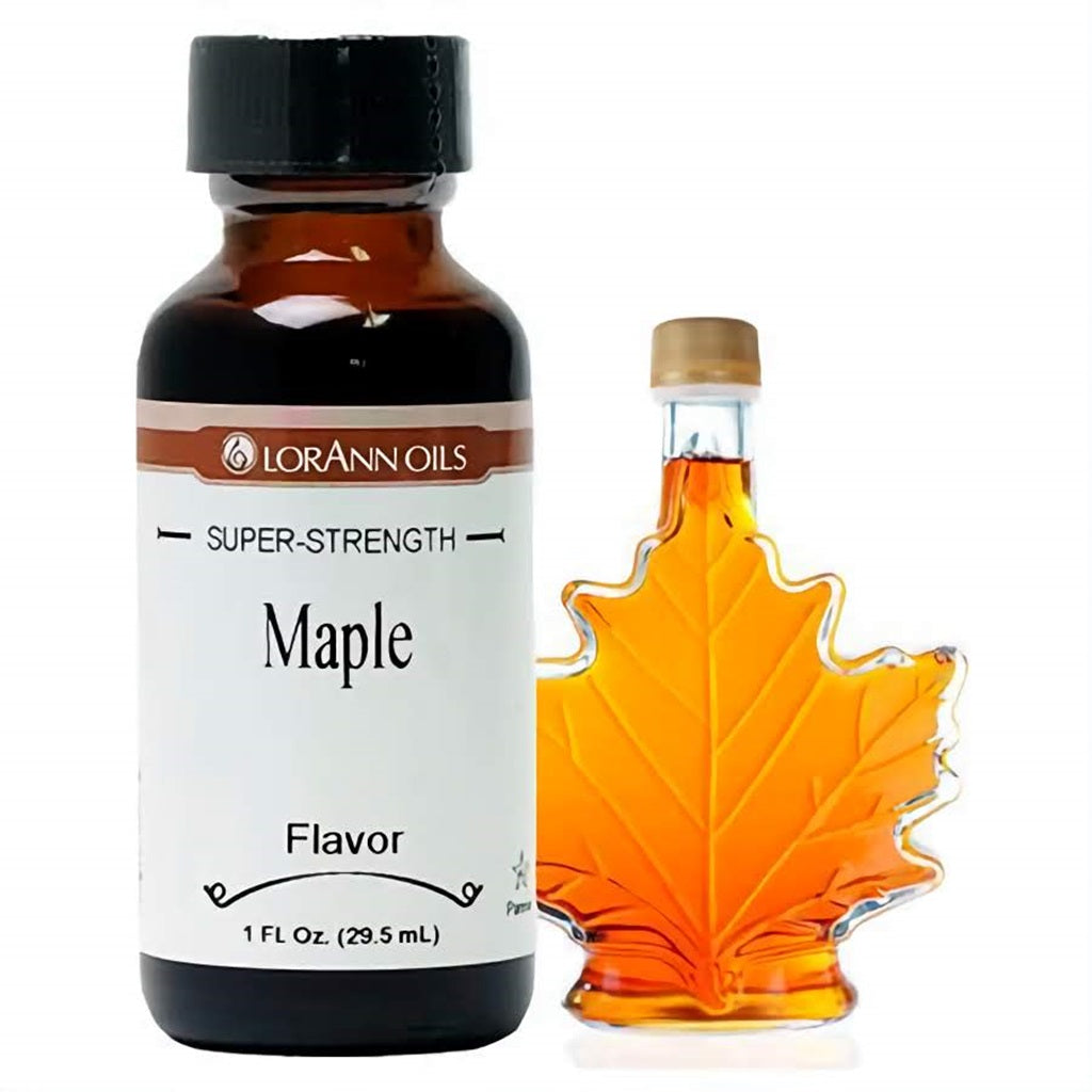 A 1 fl oz bottle of LorAnn Oils Super Strength Maple Flavor, with a maple leaf-shaped bottle of syrup, evoking the rich and sweet flavor of maple.