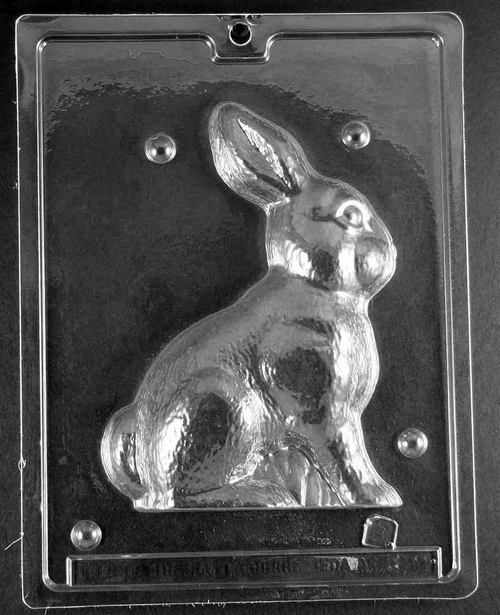 Right side chocolate mold of a front-facing bunny in a seated position, with upright ears and detailed paws.