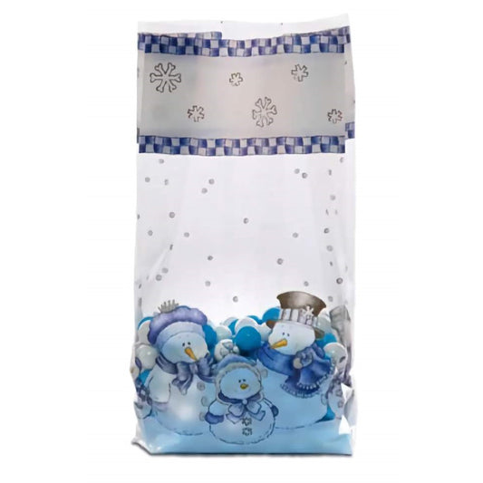 A large 'Meet the Kringles' themed cellophane treat bag, filled at the bottom with an assortment of candies. The bag showcases a delightful snowman family in various shades of blue at the base, a decorative grey band with white snowflakes, and a blue gingham pattern at the top. Above the snowflakes, the bag is clear with white dots that resemble falling snow, enhancing the winter wonderland feel of the design.