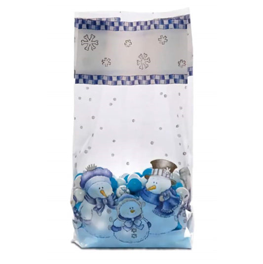 A cellophane treat bag called 'Meet the Kringles' featuring a whimsical winter scene at the bottom with a family of snowmen, adorned in blue and white winter accessories. The middle band of the bag displays white snowflakes on a grey background with a blue checked border at the top. The rest of the bag is transparent with scattered white dots resembling falling snow, all against a white background.